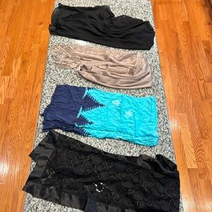 Group of 4 women’s scarves.